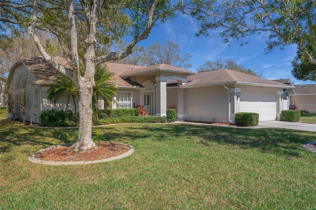 single story home with a front yard, a garage, driveway, and stucco siding