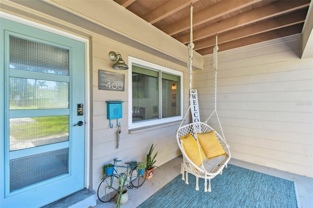 doorway to property featuring a porch