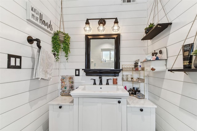 bathroom featuring visible vents and vanity