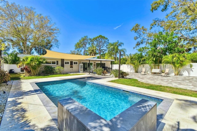 view of pool featuring a fenced in pool, a patio, and fence