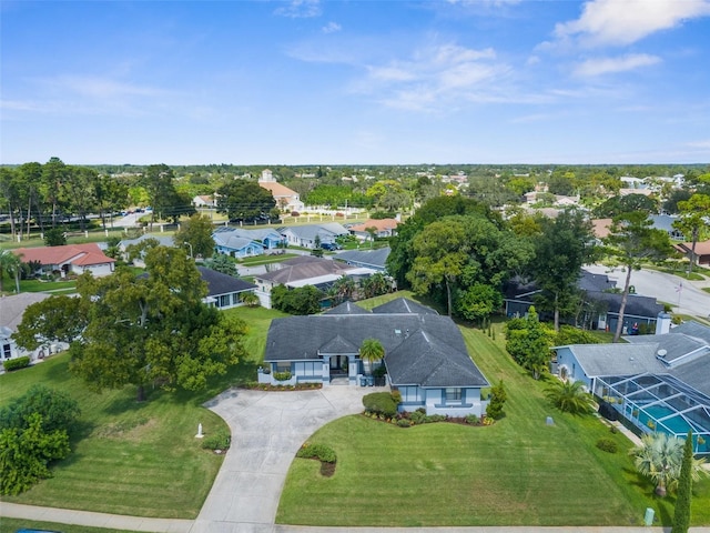 birds eye view of property with a residential view