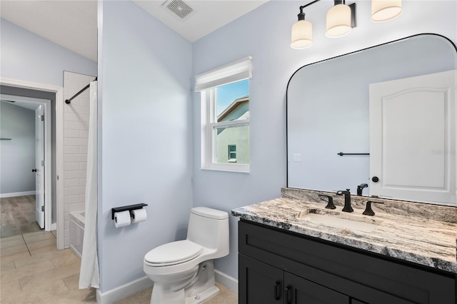 bathroom featuring baseboards, visible vents, toilet,  shower combination, and vanity