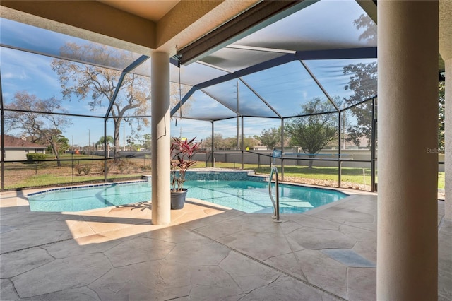 view of swimming pool with a lanai, a patio area, and a fenced in pool