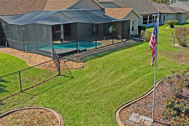 exterior space with a fenced in pool, glass enclosure, and a fenced backyard