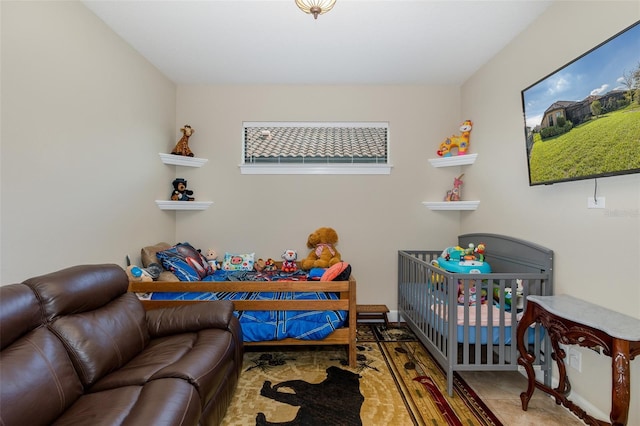 bedroom featuring baseboards