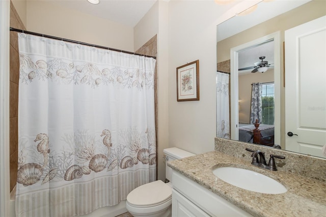 full bathroom with toilet, shower / tub combo, ceiling fan, and vanity