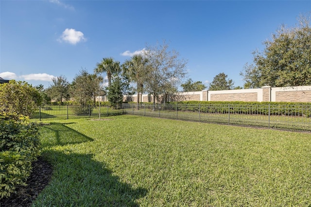 view of yard featuring fence