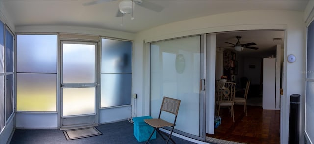 interior space featuring ceiling fan