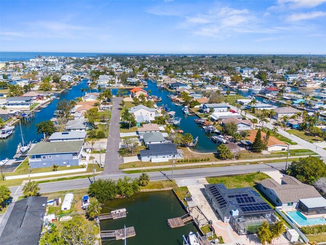 aerial view featuring a water view and a residential view