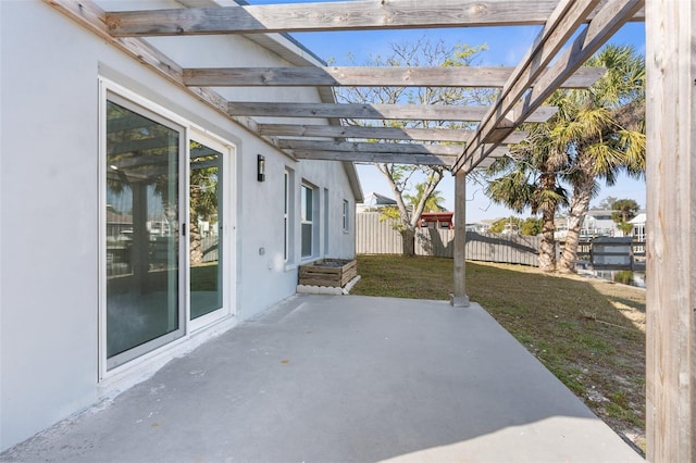 view of patio / terrace with fence and a pergola