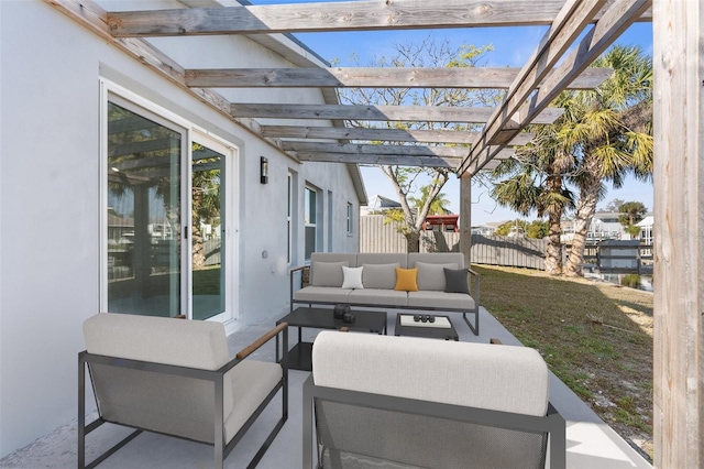 view of patio / terrace with outdoor lounge area, fence, and a pergola