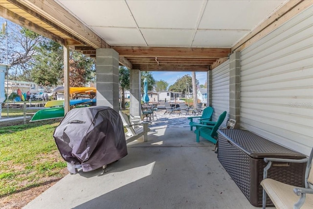 6183 Waverly Rd, Weeki Wachee, FL 34607 - view of patio / terrace featuring a grill and outdoor dining space