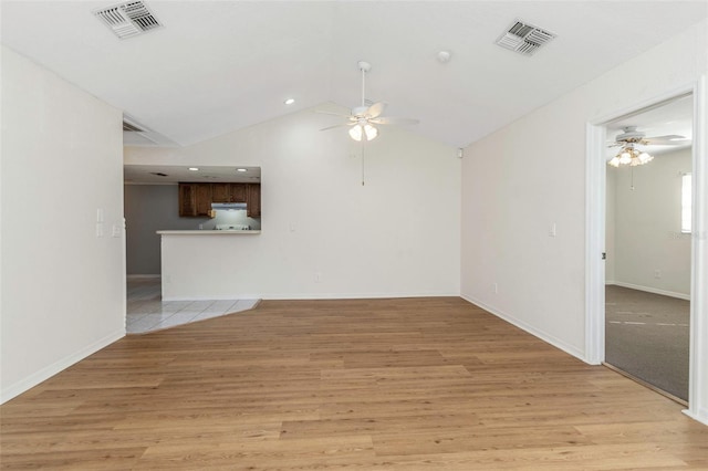 unfurnished living room featuring visible vents, light wood-style floors, and a ceiling fan