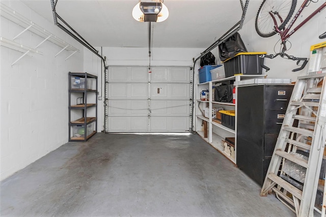 garage featuring a garage door opener