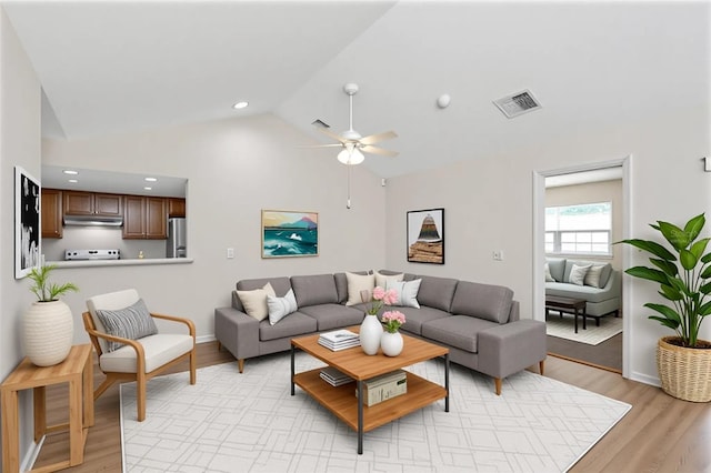 3806 River Oaks Ct, New Port Richey, FL 34655 - living room with ceiling fan, light wood-style floors, baseboards, high vaulted ceiling, and recessed lighting