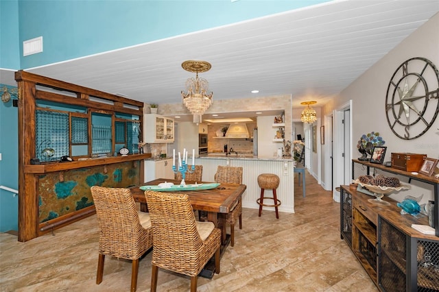 dining room featuring a notable chandelier