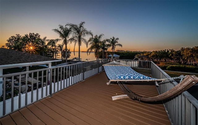 deck at dusk with a water view