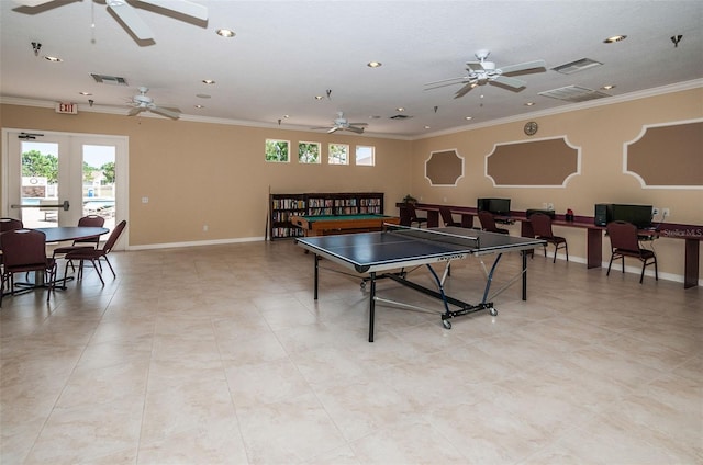 game room featuring visible vents, baseboards, ceiling fan, and crown molding