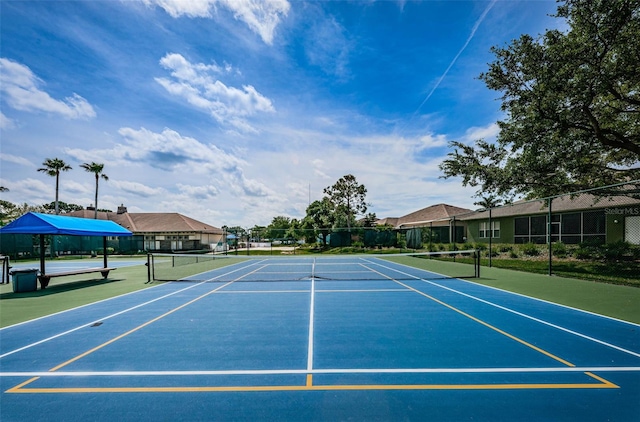 view of sport court with community basketball court and fence