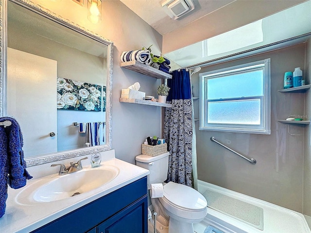 full bathroom featuring visible vents, a shower with shower curtain, vanity, and toilet