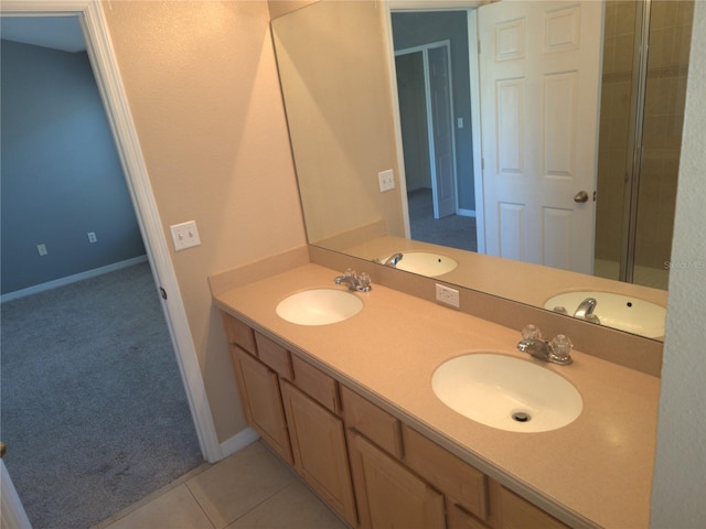 full bathroom with tile patterned flooring and a sink