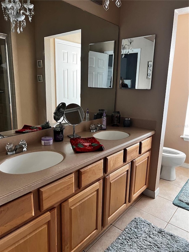 full bath featuring tile patterned flooring, a sink, and double vanity