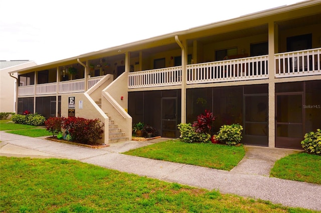 view of property with stairway