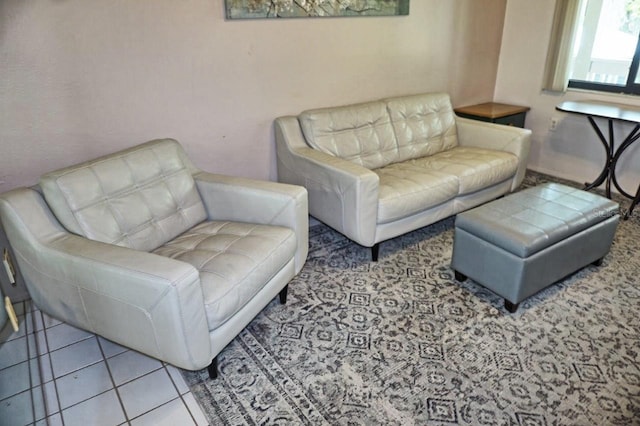 living area featuring tile patterned floors