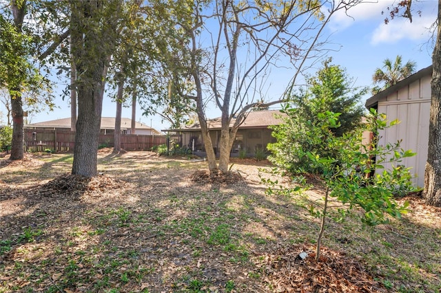 view of yard with fence