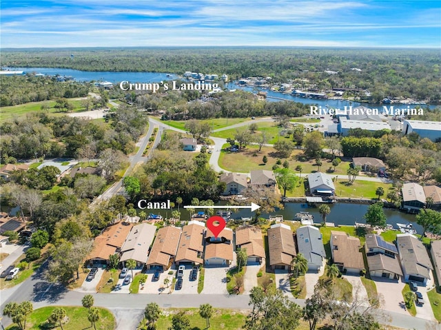 aerial view featuring a water view and a residential view