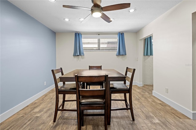 dining space featuring light wood-style flooring, baseboards, ceiling fan, and recessed lighting