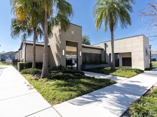 view of property featuring a fenced front yard