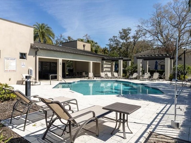 community pool featuring a patio and a pergola