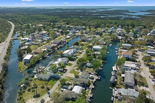 aerial view featuring a water view and a residential view