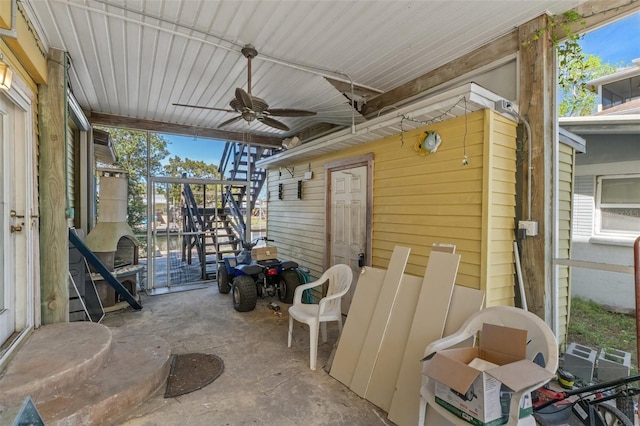 view of patio featuring ceiling fan