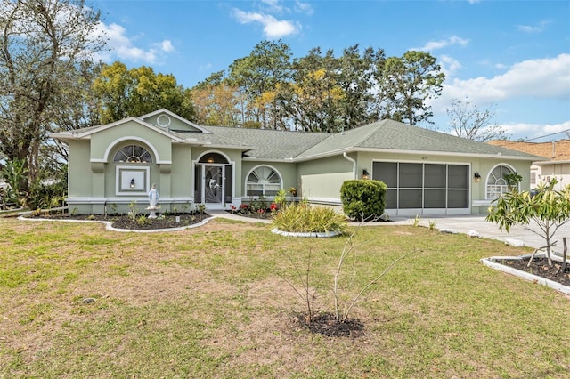 single story home featuring stucco siding, a shingled roof, a garage, driveway, and a front lawn