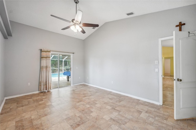 empty room featuring a ceiling fan, visible vents, vaulted ceiling, and baseboards