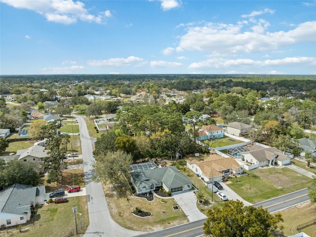 birds eye view of property with a residential view