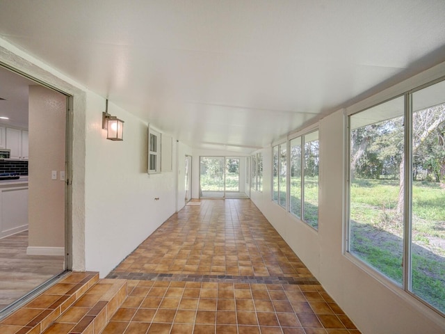 view of unfurnished sunroom