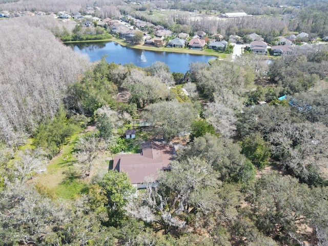 bird's eye view featuring a water view and a residential view