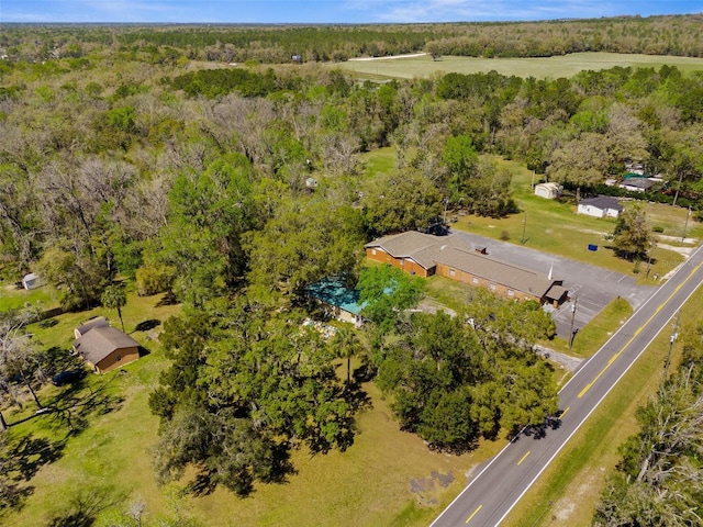 bird's eye view with a view of trees