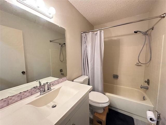 bathroom featuring a textured ceiling, vanity, shower / bath combo with shower curtain, and toilet