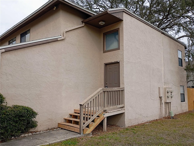 exterior space with stucco siding