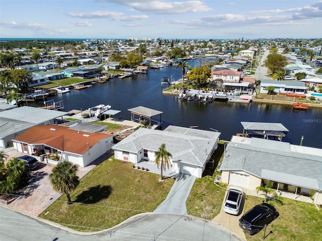 aerial view featuring a water view and a residential view