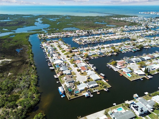 aerial view featuring a residential view and a water view