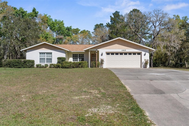 ranch-style home featuring a garage, driveway, and a front lawn