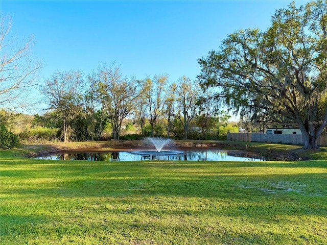 view of yard with a water view