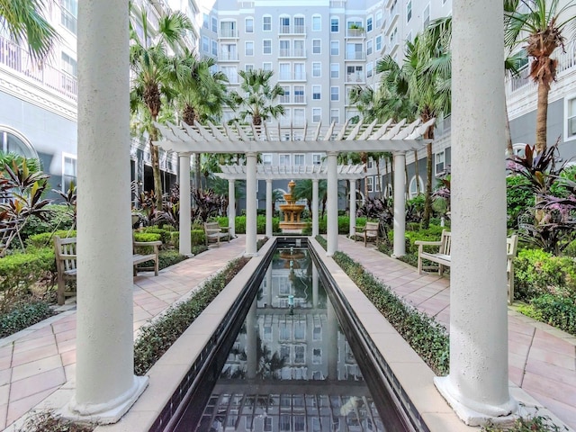 view of property's community featuring a pergola