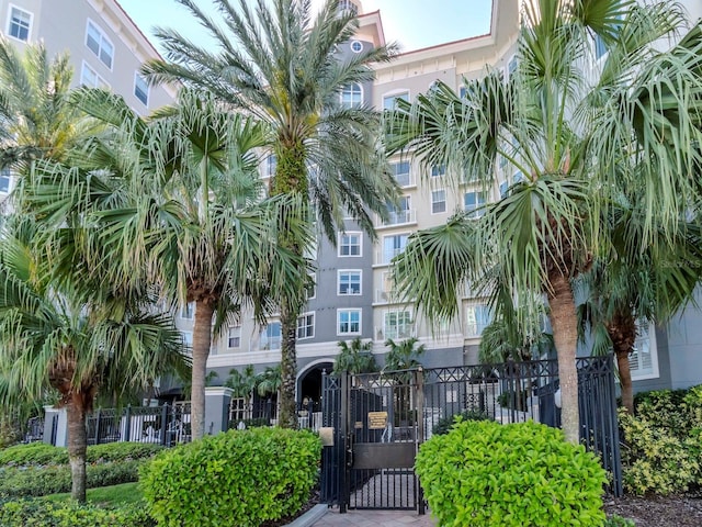 view of building exterior featuring fence