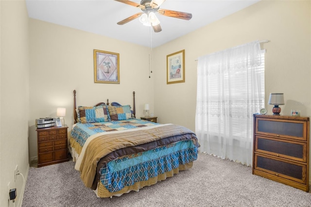 bedroom featuring a ceiling fan and carpet flooring